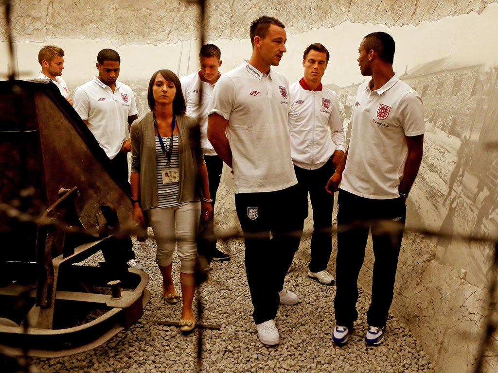 John Terry, Scott Parker and Ashley Cole during a visit by an England Football Association delegation to the Schindler Factory