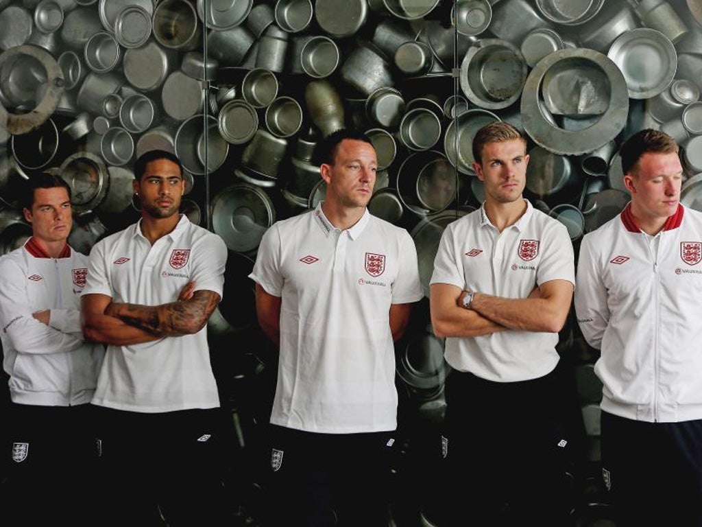 England players (from left) Scott Parker, Glen Johnson, John Terry, Jordan Henderson and Phil Jones at Schindler's factory yesterday