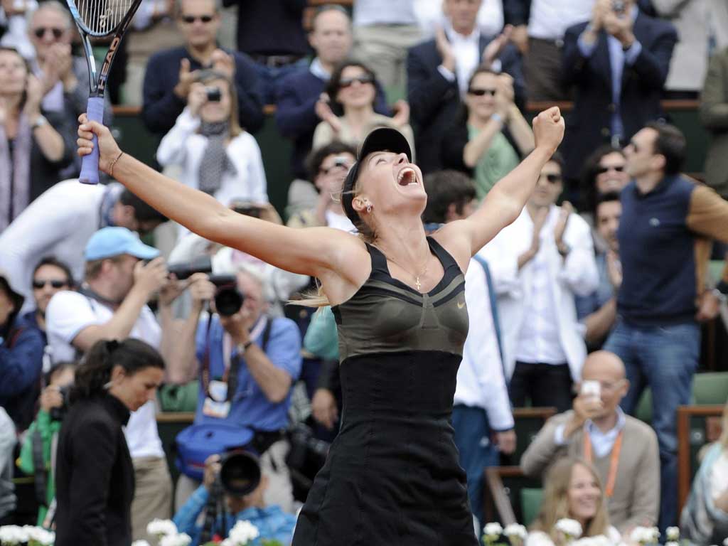 Full set: Maria Sharapova celebrates her victory over the
Italian Sara Errani