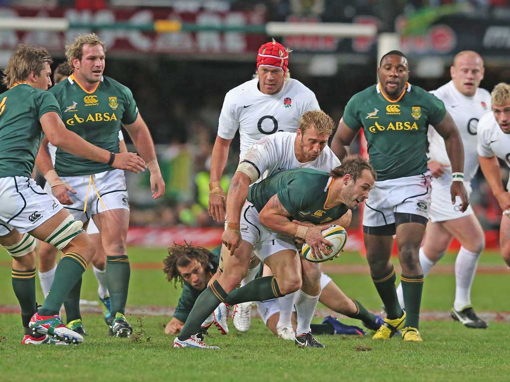 South Africa’s Francois Hougaard is tackled by England’s Chris Robshaw during the first Test in Durban