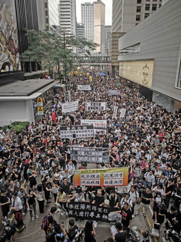 Thousands attended a rally in Hong Kong yesterday to
publicise the case of Li Wangyang