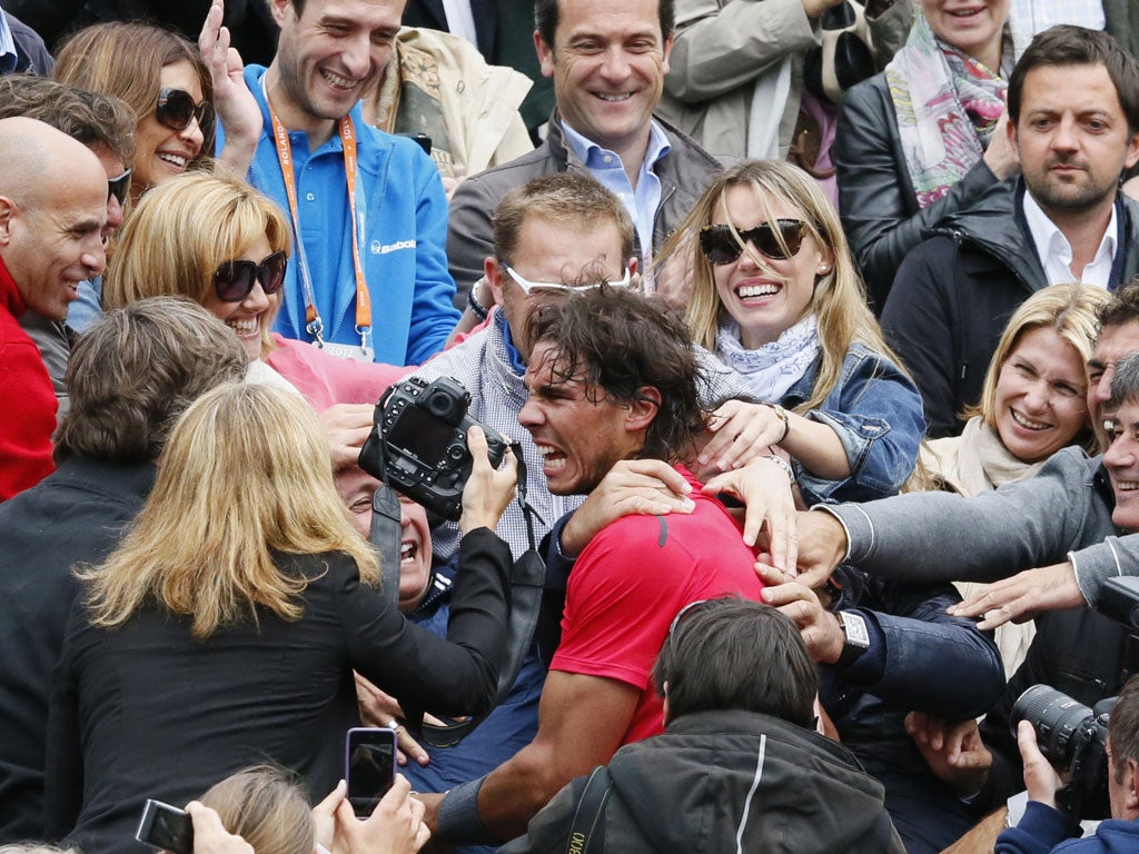 An emotional Nadal heads into the crowd