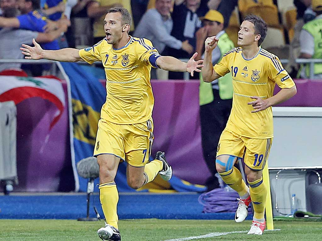 Andriy Shevchenko (left) of Ukraine celebrates after scoring the 2-1 with Yevhen Konoplyanka during the Group D preliminary round match of the Euro 2012 against Sweden