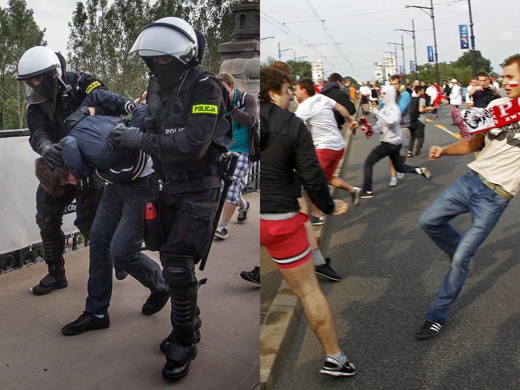 Pre-match kick-off: Police arrest a Polish fan, top, after clashes with Russian supporters ahead of the two countries' Euro 2012 Group A match in Warsaw on Tuesday