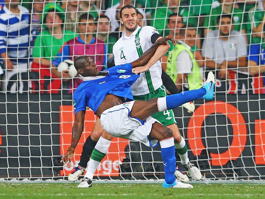 Mario Balotelli of Italy scores the second goal against Ireland