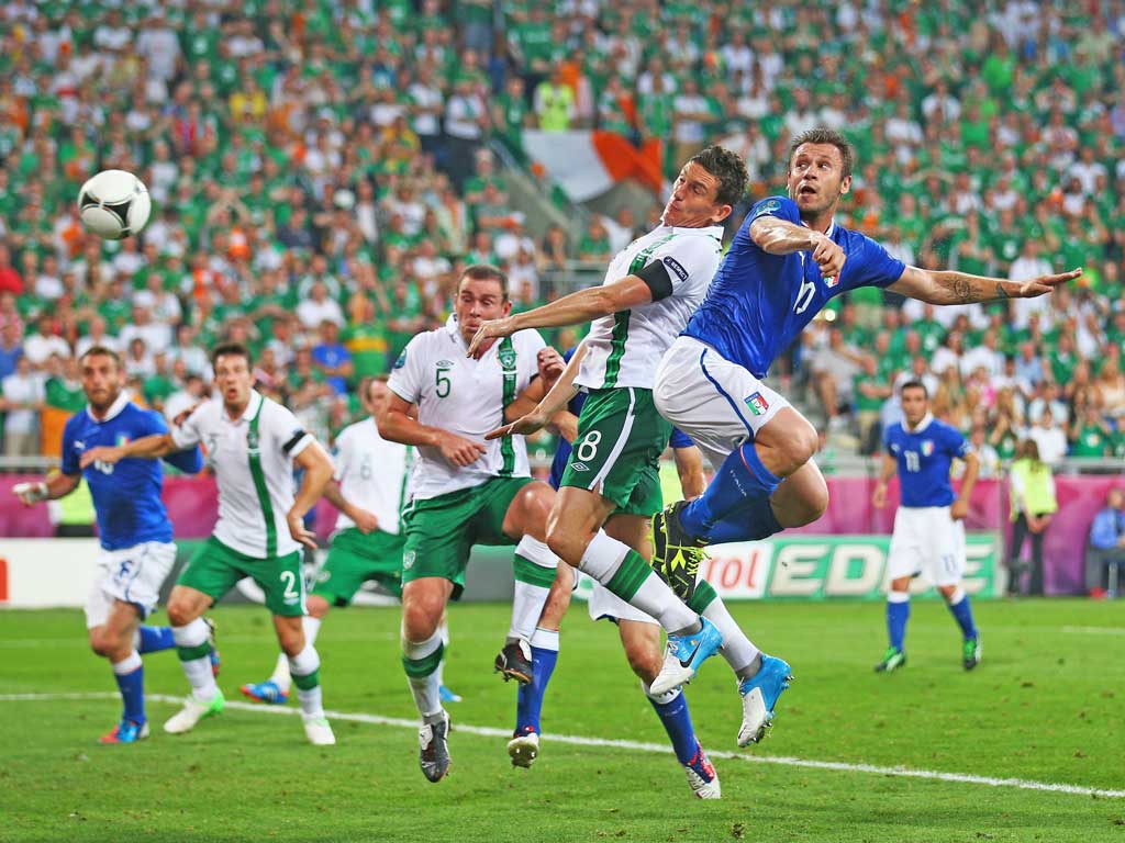 Antonio Cassano of Italy heads in the opening goal during the UEFA EURO 2012 group C match against Ireland