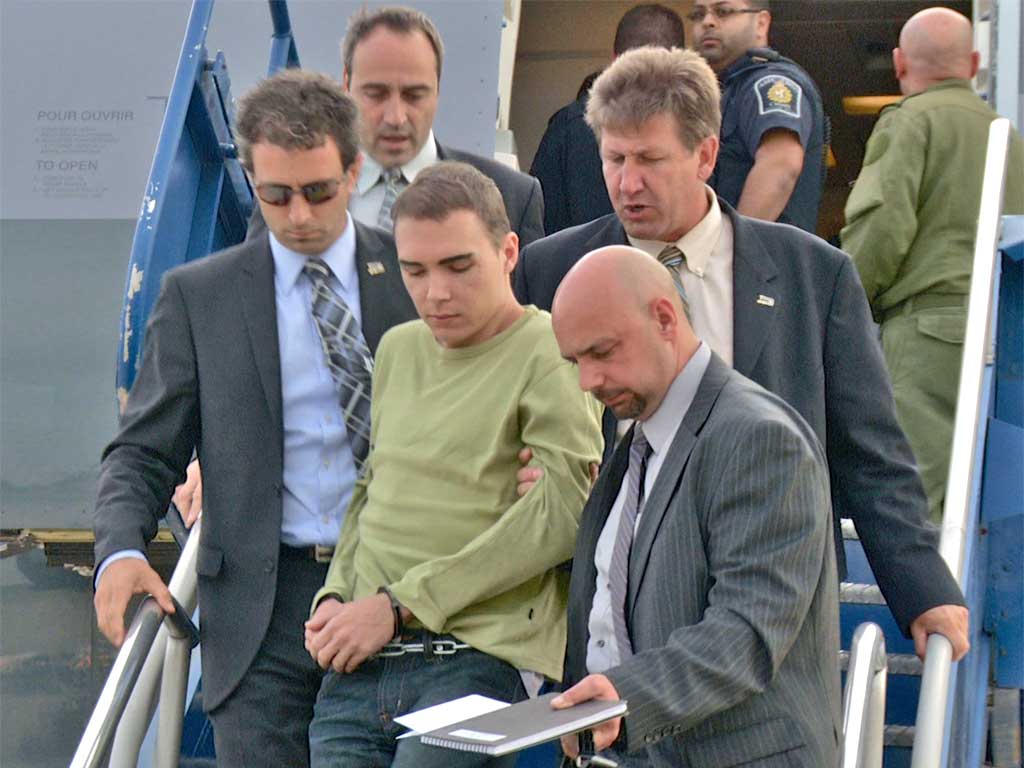 Luka Magnotta arrives at Montreal’s Mirabel Airport