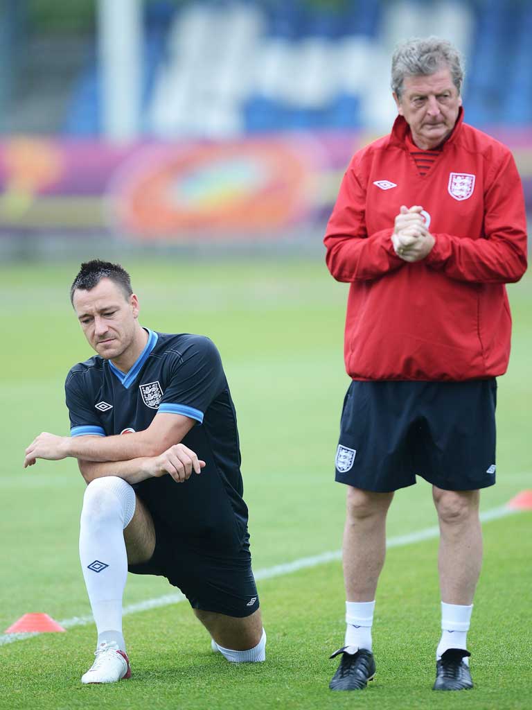 England manager
Roy Hodgson is
joined by John
Terry