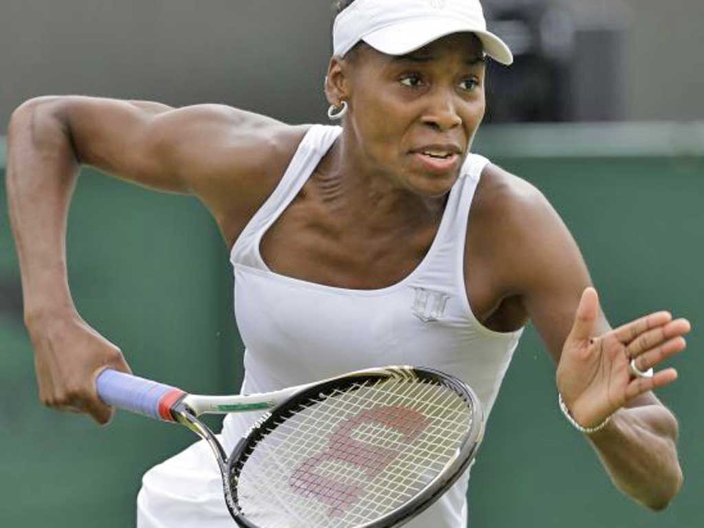 Venus Williams said she would return to
Wimbledon next year