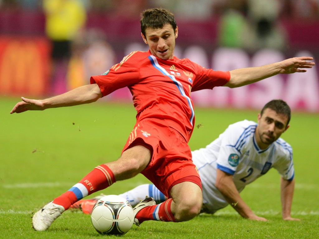 Alan Dzagoev's absence will hurt Russia's hopes (Getty)