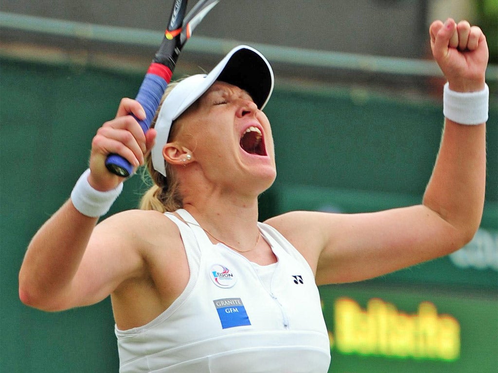 Elena Baltacha screams with delight after reaching round two at Wimbledon yesterday