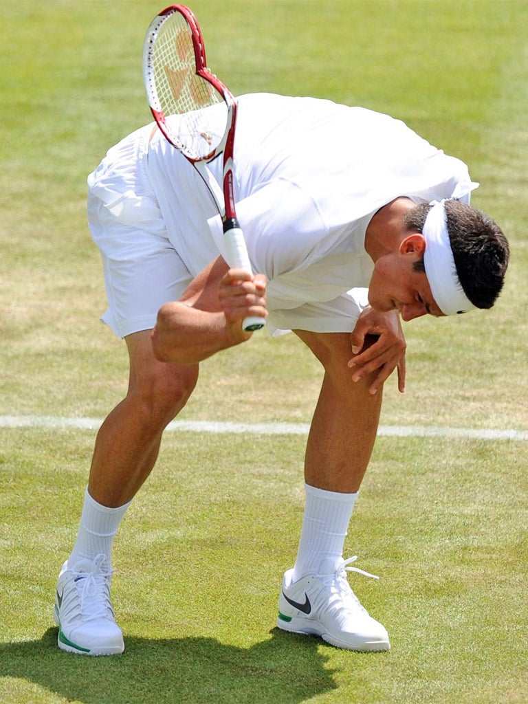 Bernard Tomic shows his frustration