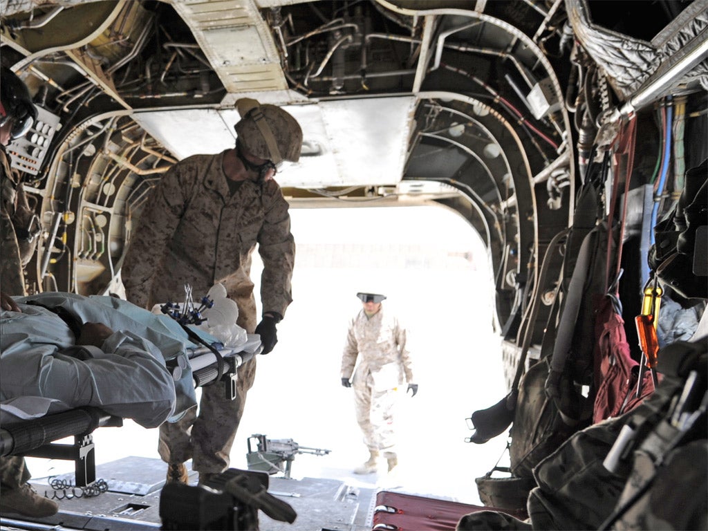 A casualty arrives at Camp Bastion in Afghanistan's Helmand province
