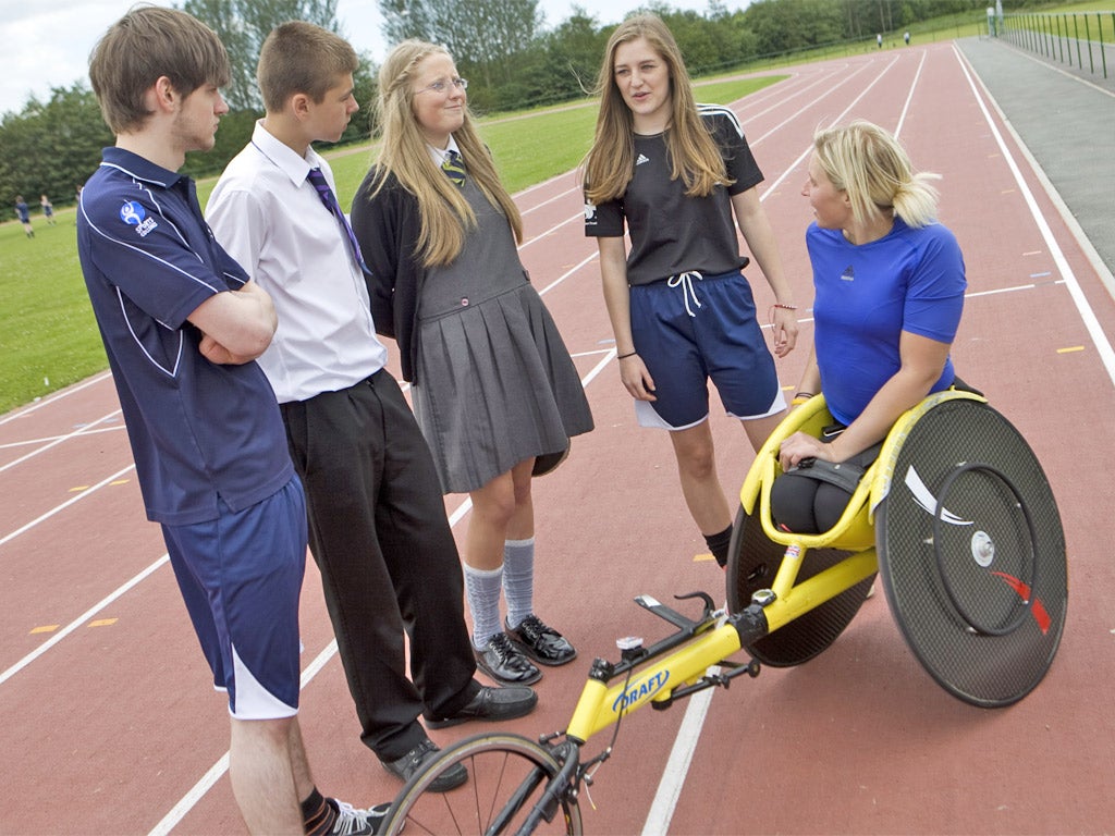 Fast girl: Paralympian Shelly Woods with pupils from Kirkby Sports College