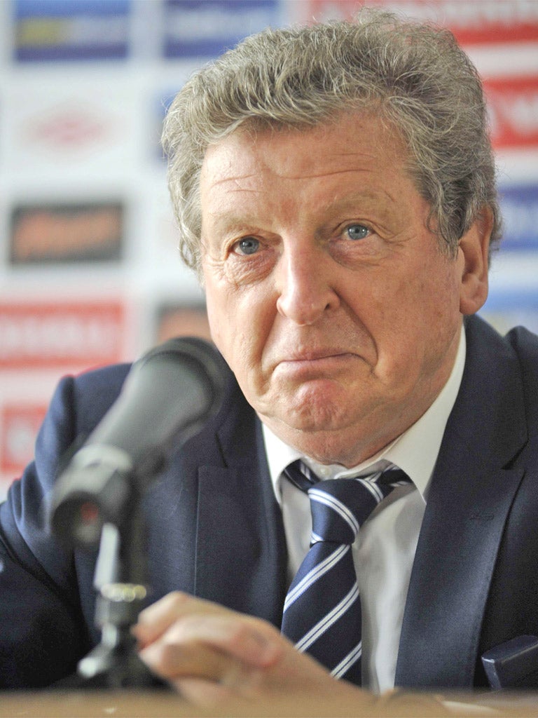 Roy Hodgson defended Wayne Rooney after criticism from Fabio Capello