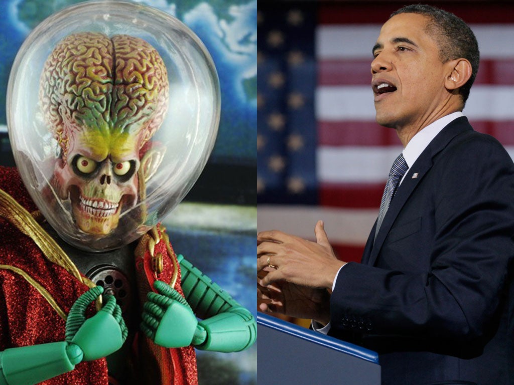 Take me to your leader: American voters were asked which American presidential candidate they thought would be better able to handle an alien onslaught. Sixty-four percent of them thought current President Obama (right) would be able to handle the likes o