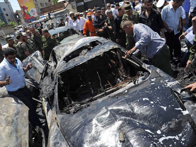 An explosion outside the Palace of Justice in central Damascus