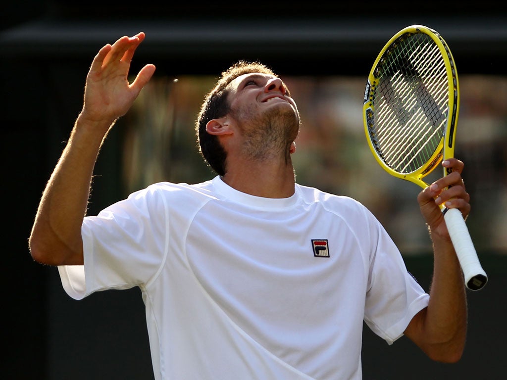 James Ward
reacts during his
match against
Mardy Fish