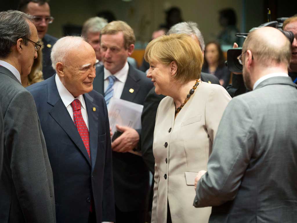 German Chancellor Angela Merkel and Greek President Karolos Papoulias (centre left) at the summit last night