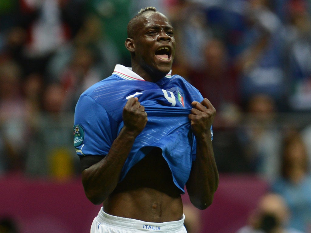 Mario Balotelli celebrates his first goal