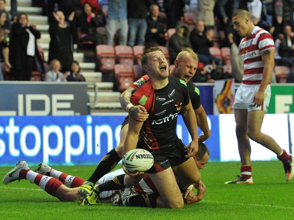 Elliott Whitehead celebrates scoring Bradford's fourth try