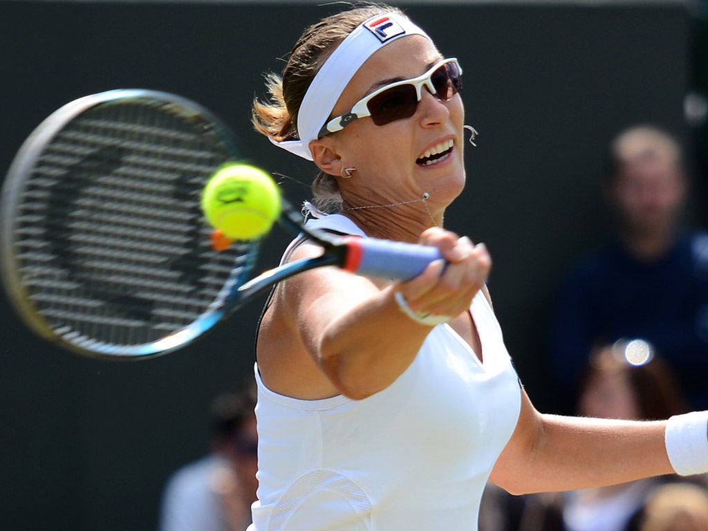 Kazakh Yaroslava Shvedova plays a forehand in her win against Sara Errani