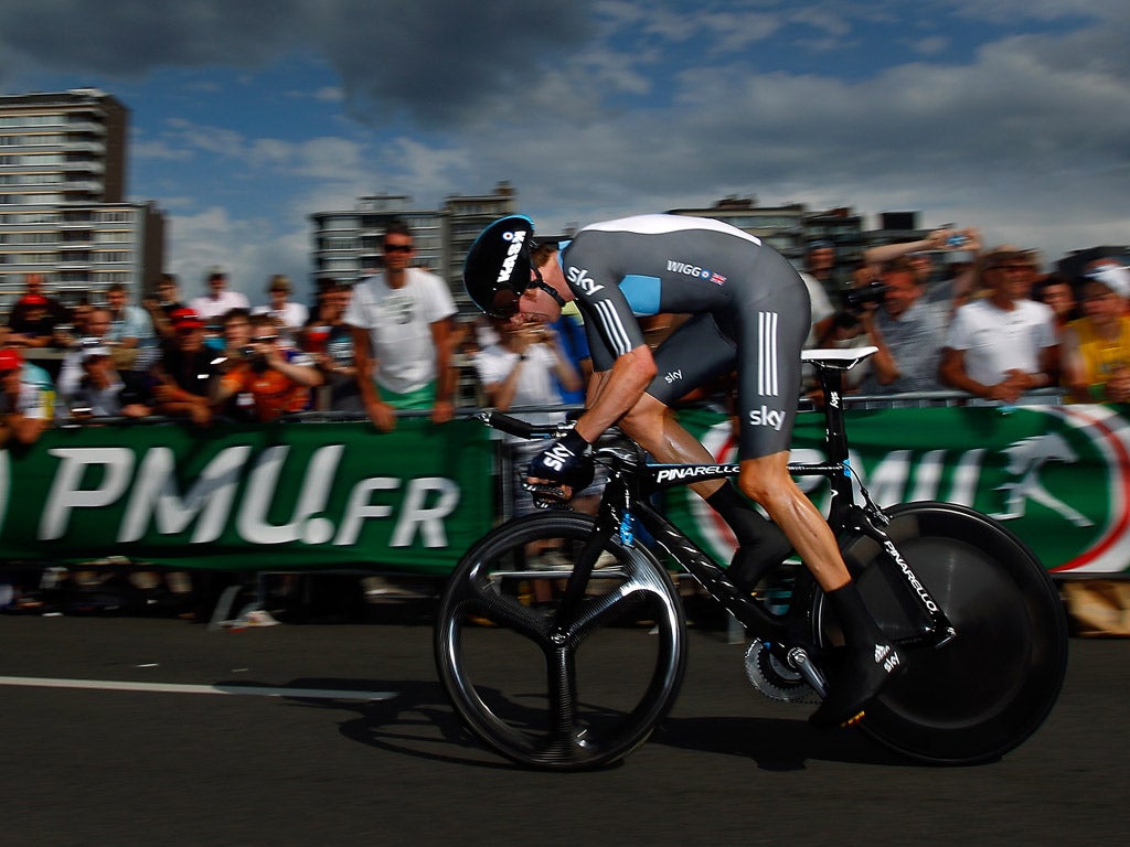 Flying start:
Bradley Wiggins
on his way to
second place
in yesterday's
prologue in
Liège, won by
the Swiss Fabian
Cancellara