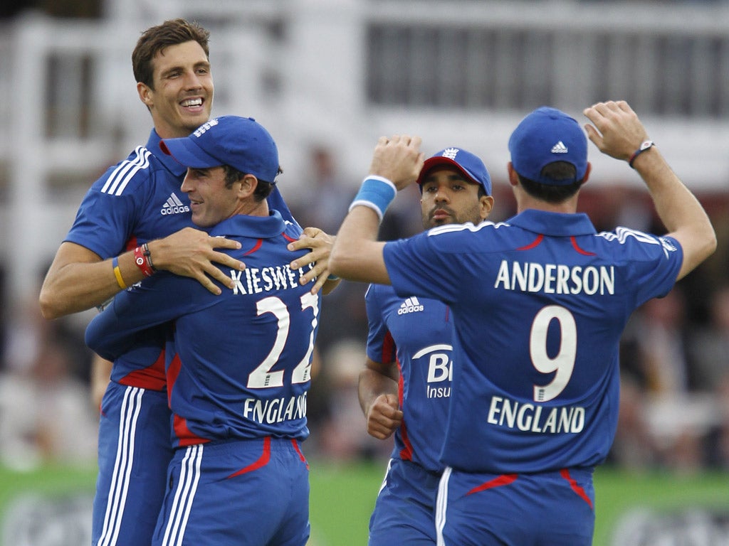 Speed king: Steve Finn (far left) bowls Australia's David Hussey