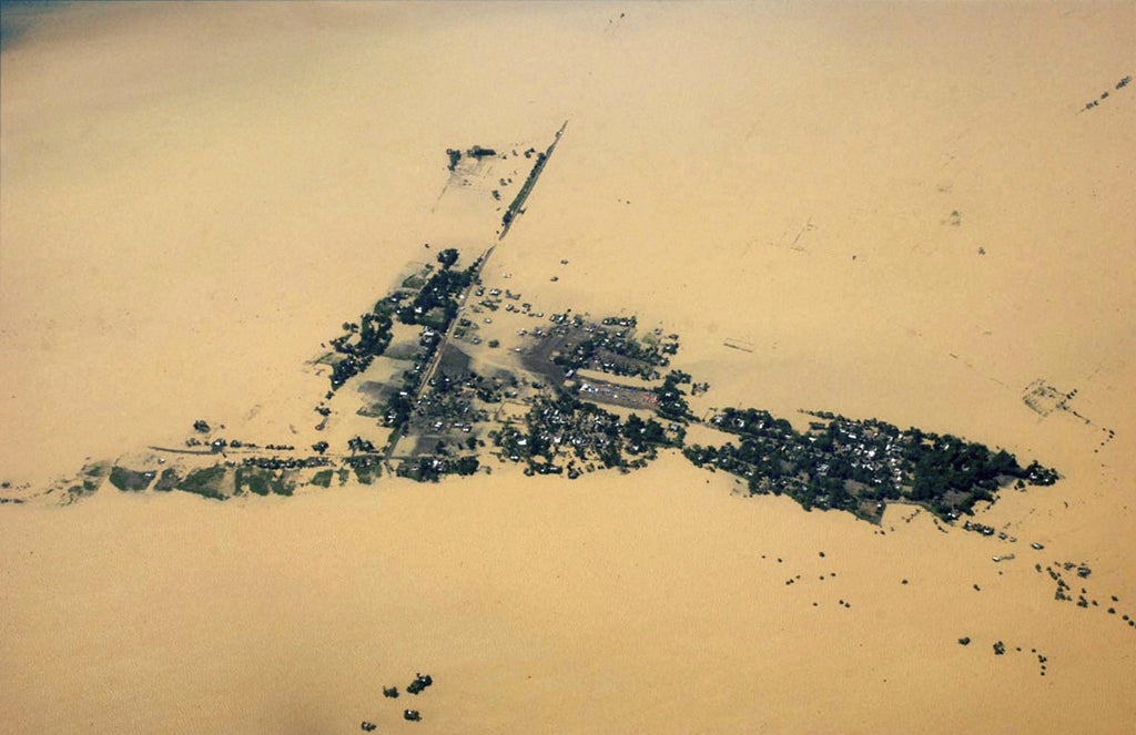 This aerial photo shows a flooded area of Jorhat in Assam state, India, Monday, July 2, 2012. The floods from monsoon rains in northeastern India killed dozens of people, with more than 2,000 villages inundated as rivers breached their banks, an official said Sunday. (
