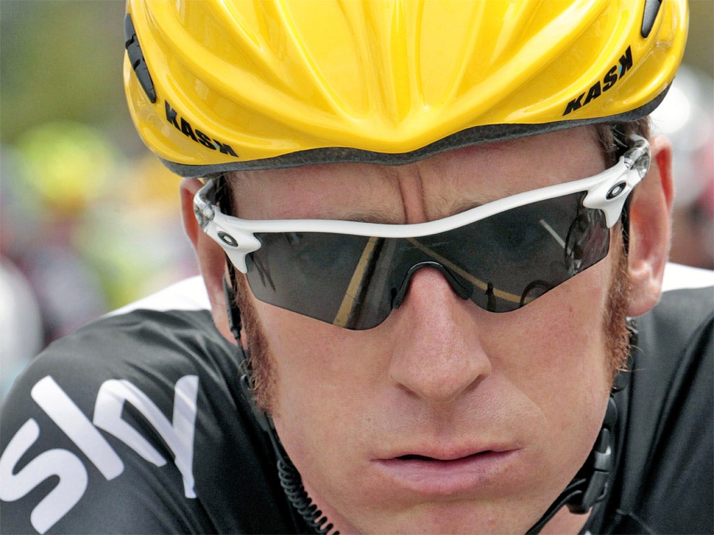 Bradley Wiggins stopped just in time to miss yesterday's crash