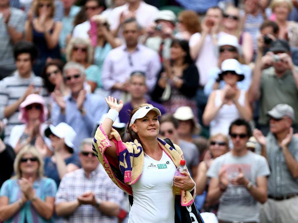 Radwanska celebrates after reaching the final