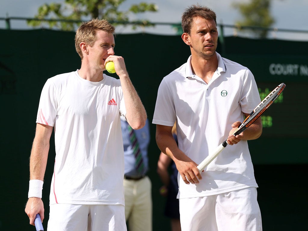 Jonathan Marray (L) of Great Britain and team-mate Frederik Nielsen of Denmark