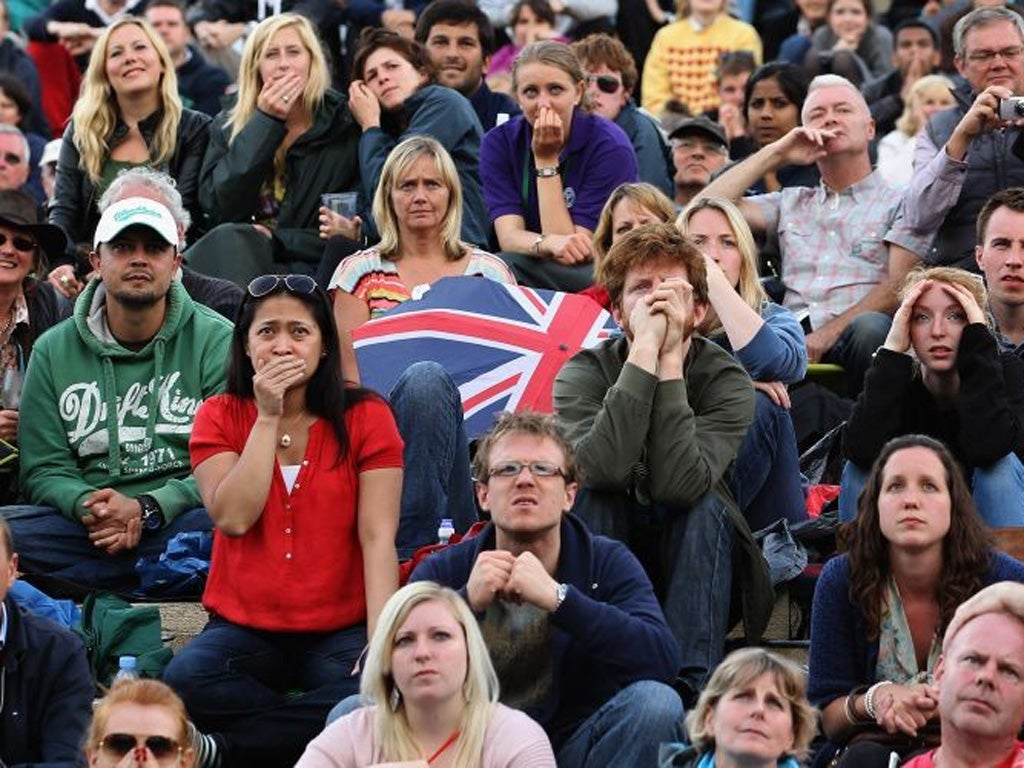 A desolate Murray Mount as the British number 1 slipped to defeat in yesterday's Wimbledon final