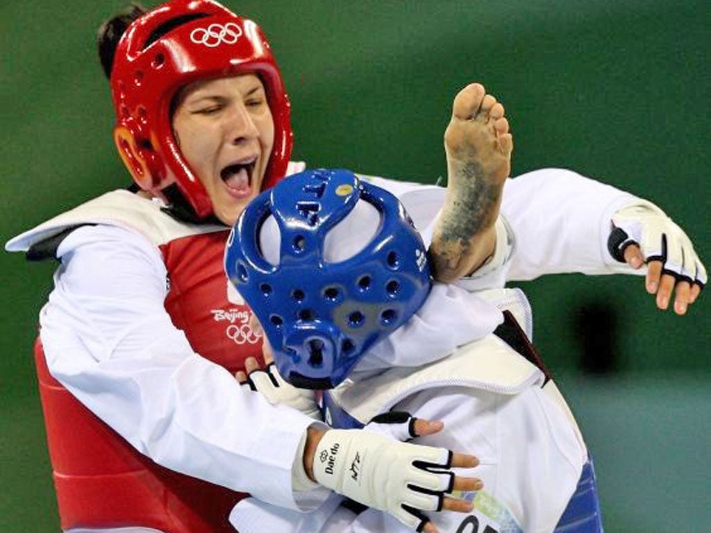 Sarah Stevenson (left) on her way to a bronze medal in Beijing