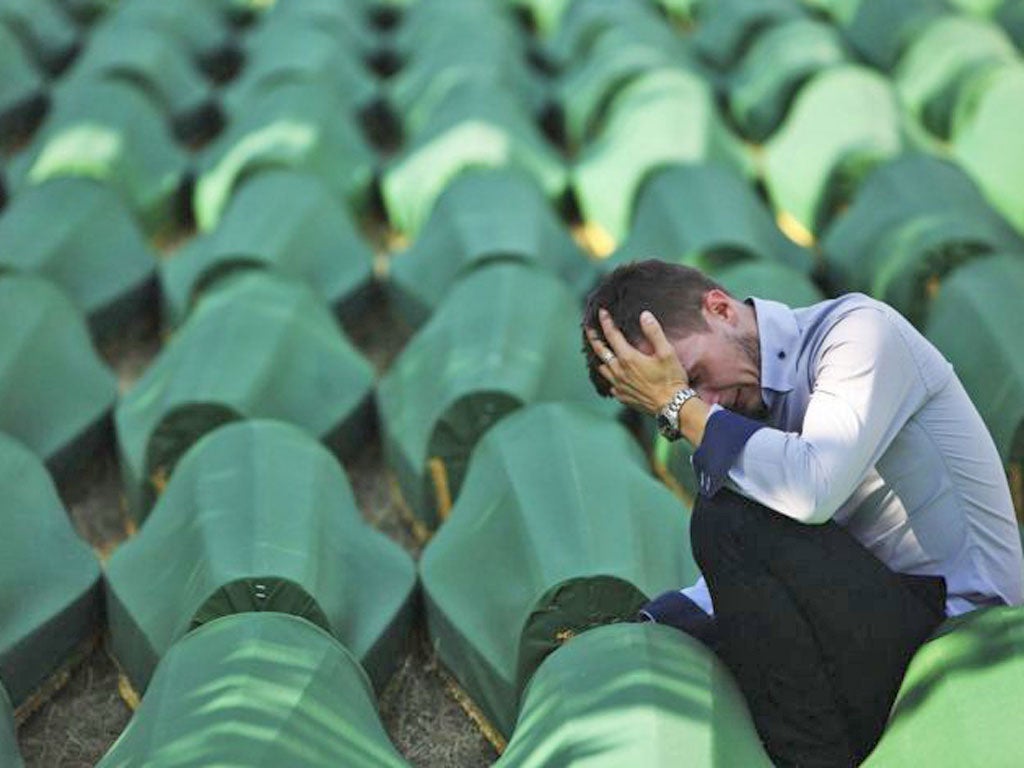 The remains of 520 newly identified victims of the massacre were buried during a commemoration ceremony at the memorial centre in the nearby town of Potocari