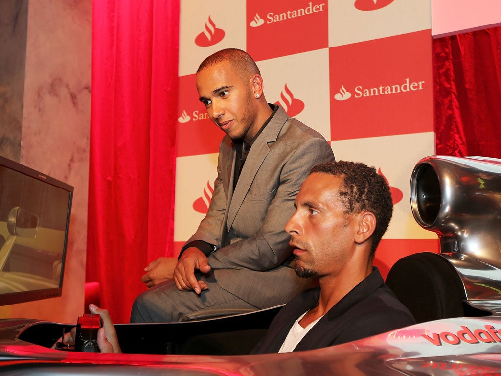 Rio Ferdinand pictured with Lewis Hamilton, enjoying some time off