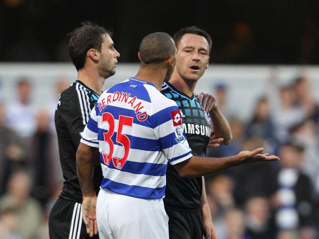 Anton Ferdinand and John Terry argue during the match