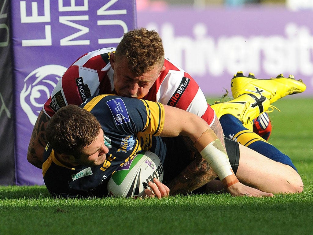 Zak attack: Leeds full-back Zak Hardaker scores a try during the Challenge Cup semi-final against Wigan