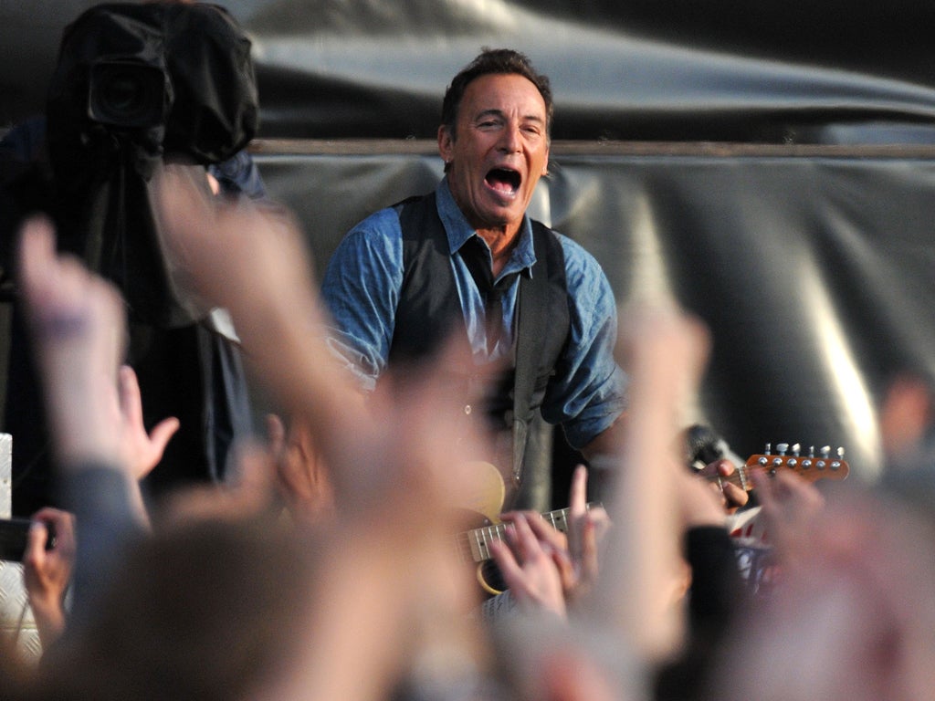 Bruce Springsteen performs live on stage during the second day of Hard Rock Calling at Hyde Park