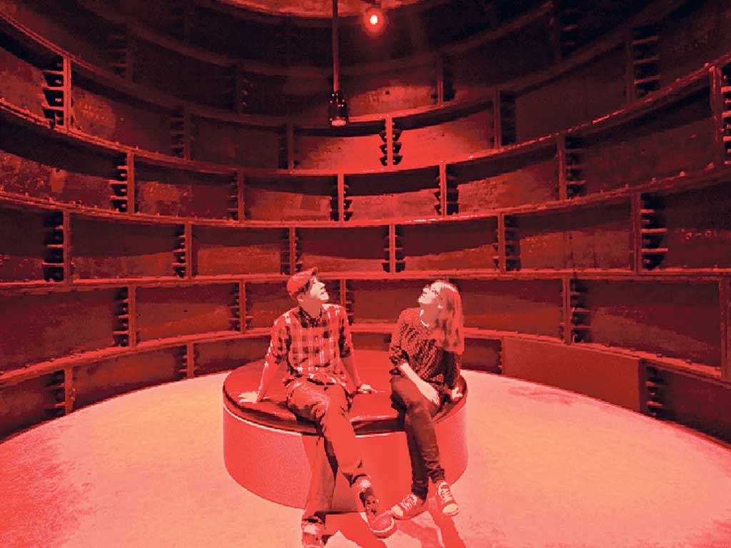 Blanket coverage: visitors listen to Suzanne Lacy's sound piece 'The Crystal Quilt'