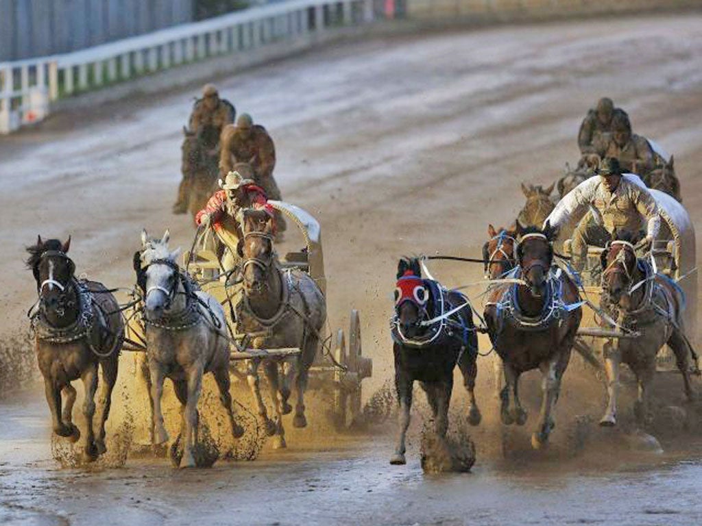 The Rangeland Derby Chuckwagon finals at the 100th Anniversary of the Calgary Stampede Rodeo in Calgary, Alberta