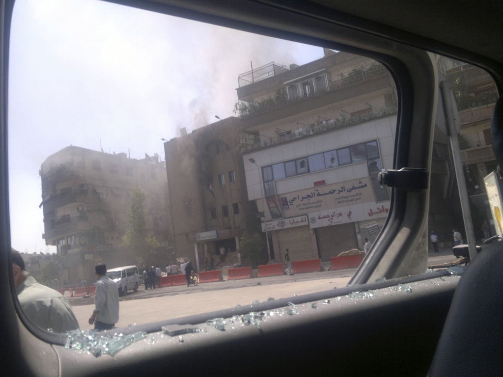 Civil war: Fighting between rebels and Syrian troops at a camp for Palestinian refugees in Damascus