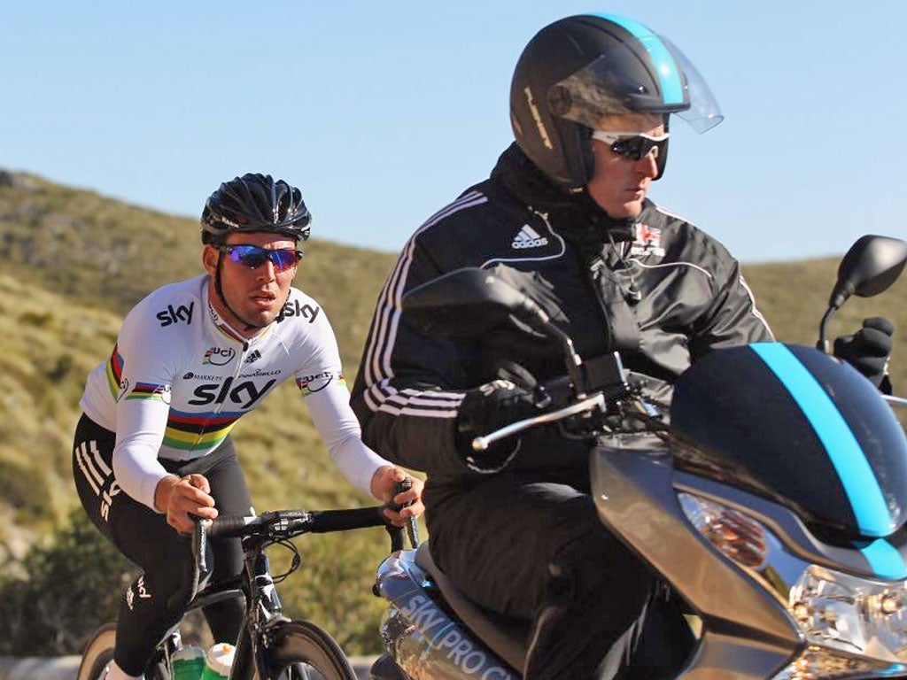 Mark Cavendish is paced by Rod Ellingworth during a Team Sky training camp