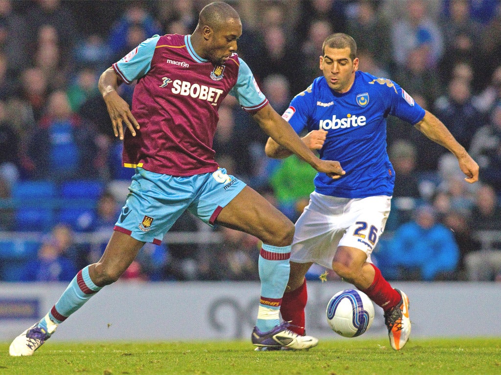 Tal Ben Haim (right) is owed a substantial amount of money