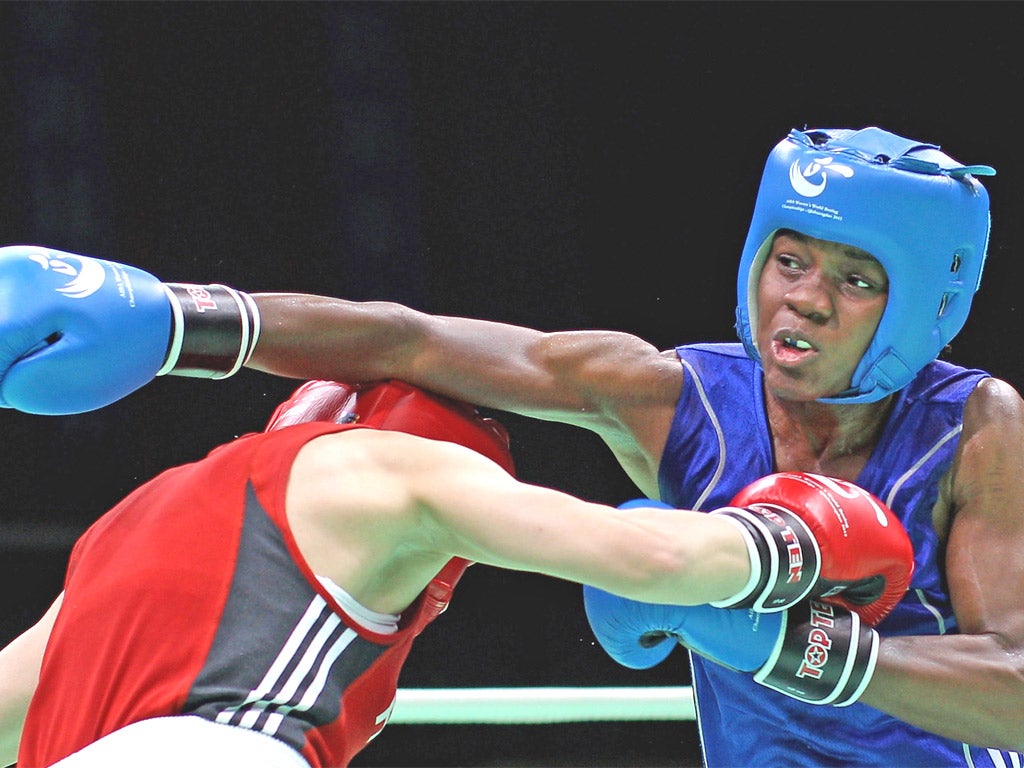 Nicola Adams in action against Elena Savelyeva, of Russia