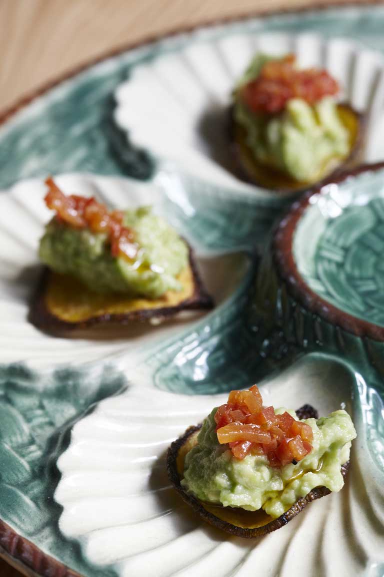 Plantain crisps with guacamole and salsa