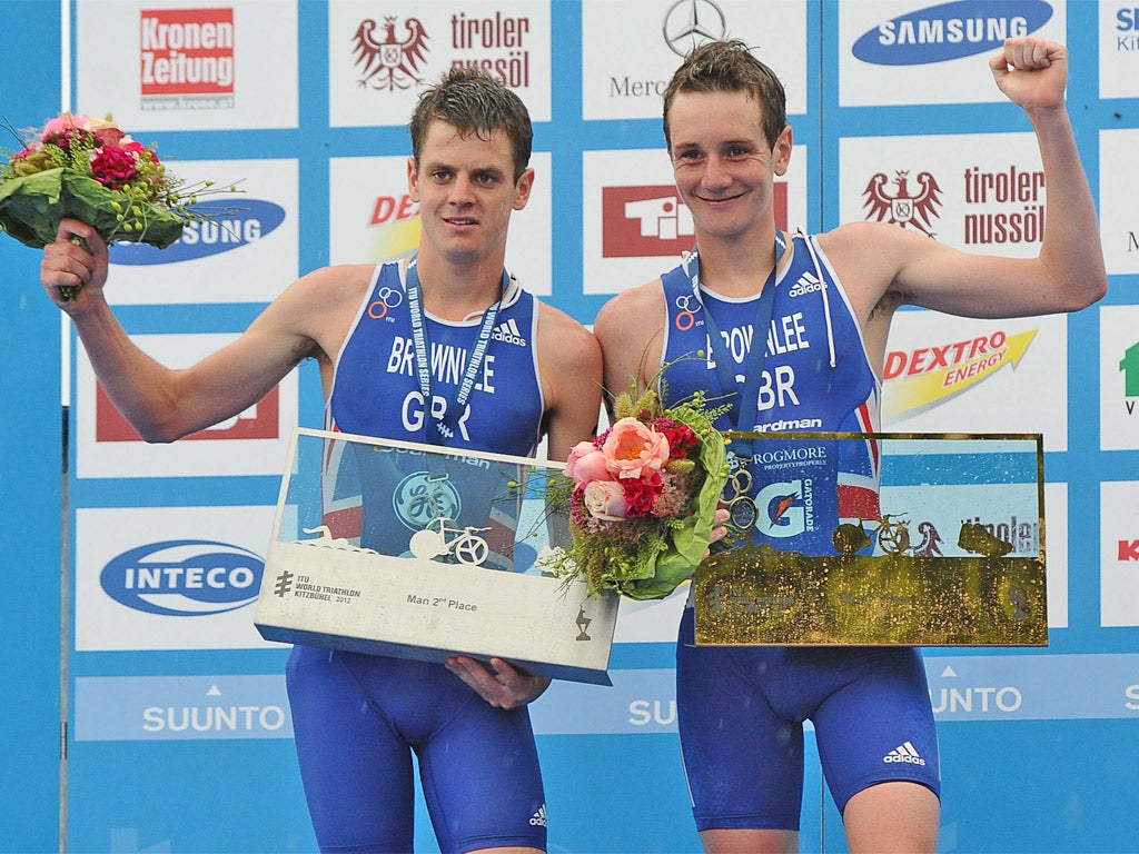 Alistair Brownlee (right) celebrates gold in the men's short distance at the ITU Triathlon World Championships Series in Kitzbühel last month with his brother Jonny, who came second