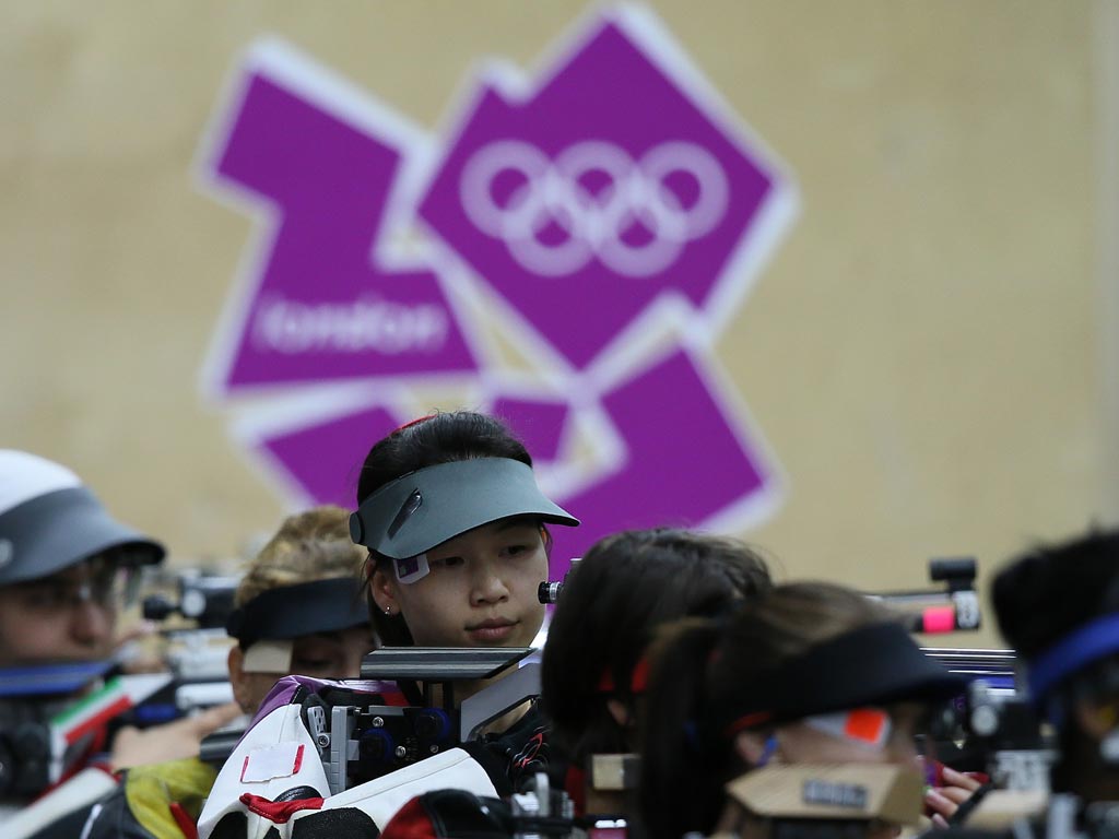 Yi Siling of China in action on Saturday morning. She became the first gold medalist of London 2012