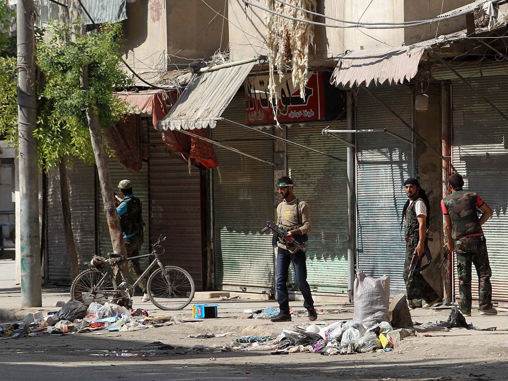 Rebels patrolling Aleppo