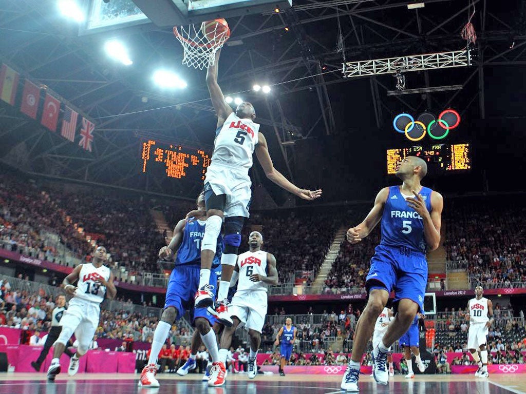 Kevin Durant dunks the ball against France